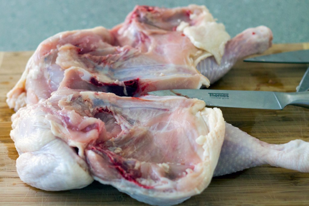 Slicing the breastbone for Spatchcock Chicken